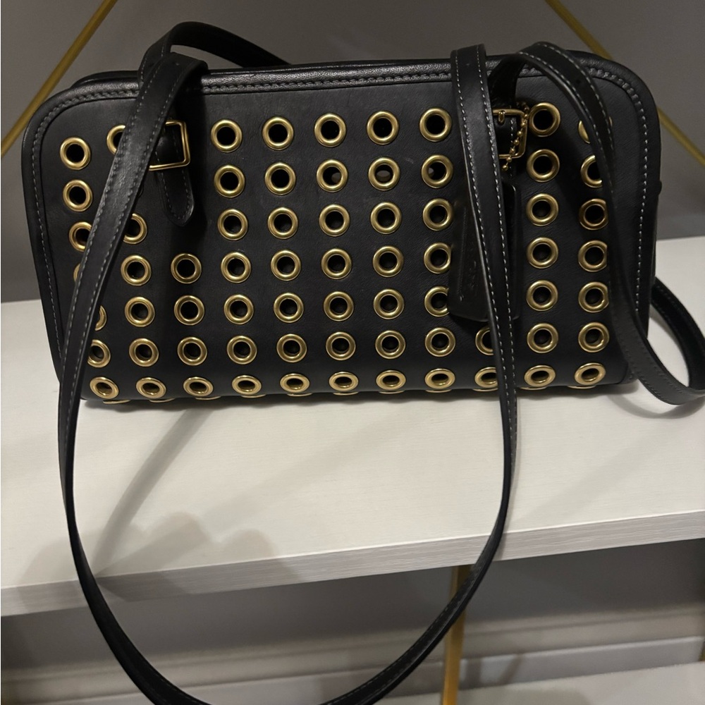 Coach Grommet Swing Zip